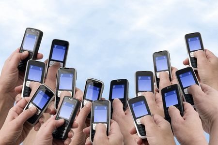 Multiple people texting on mobile phones